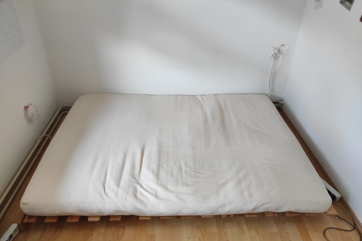 Foldable futon sofa-bed, that I originally used - unfolded.